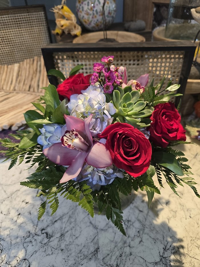 Succulents, roses and orchids OH MY!