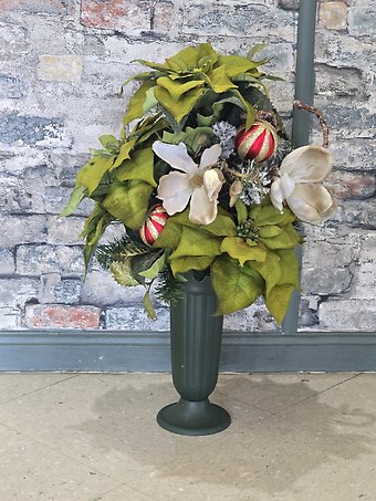 Green poinsettia cemetery cone