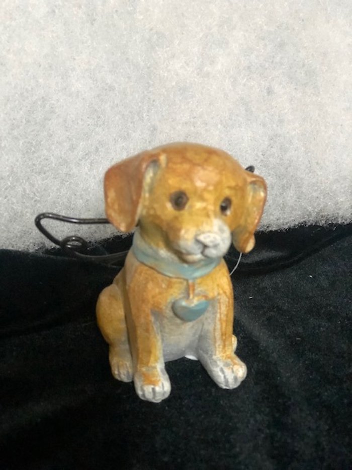 Small dog memorial with metal wings